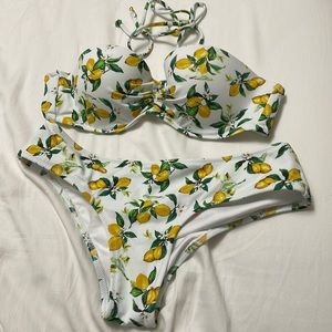 Lemon print bikini set. Small bottoms and 36 A top,only tried on